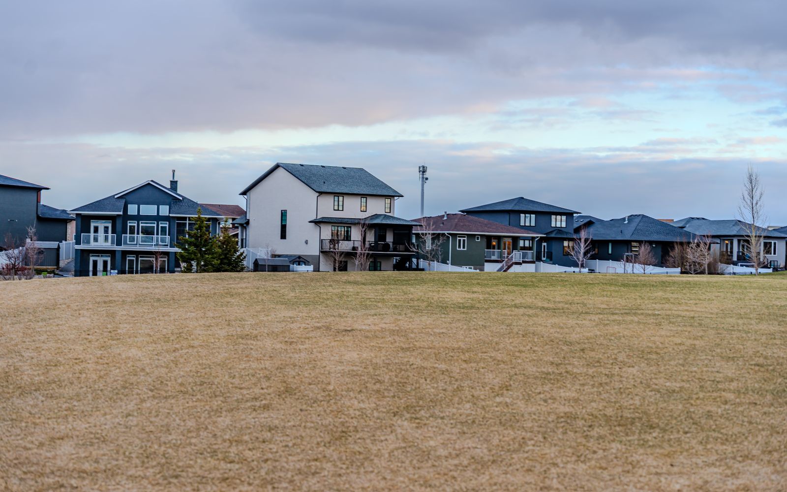 Townhomes beside a small lake at The Landings