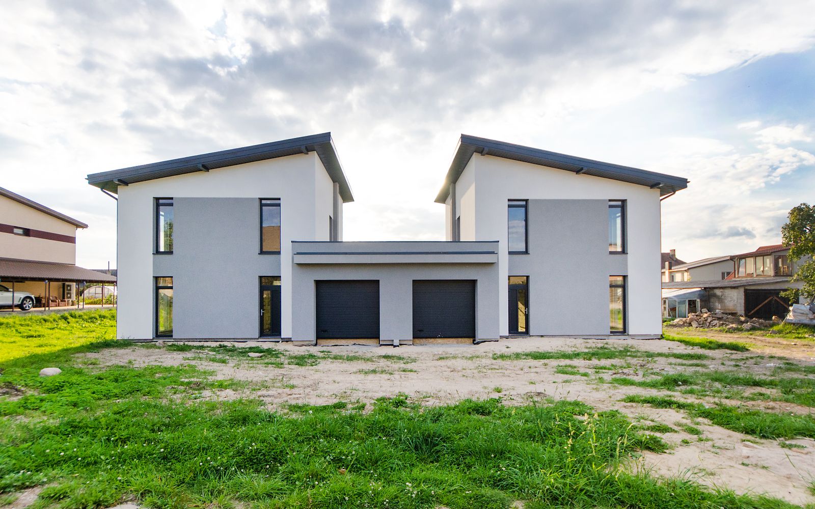 Two-story modern home with a covered porch in Rigden Farm